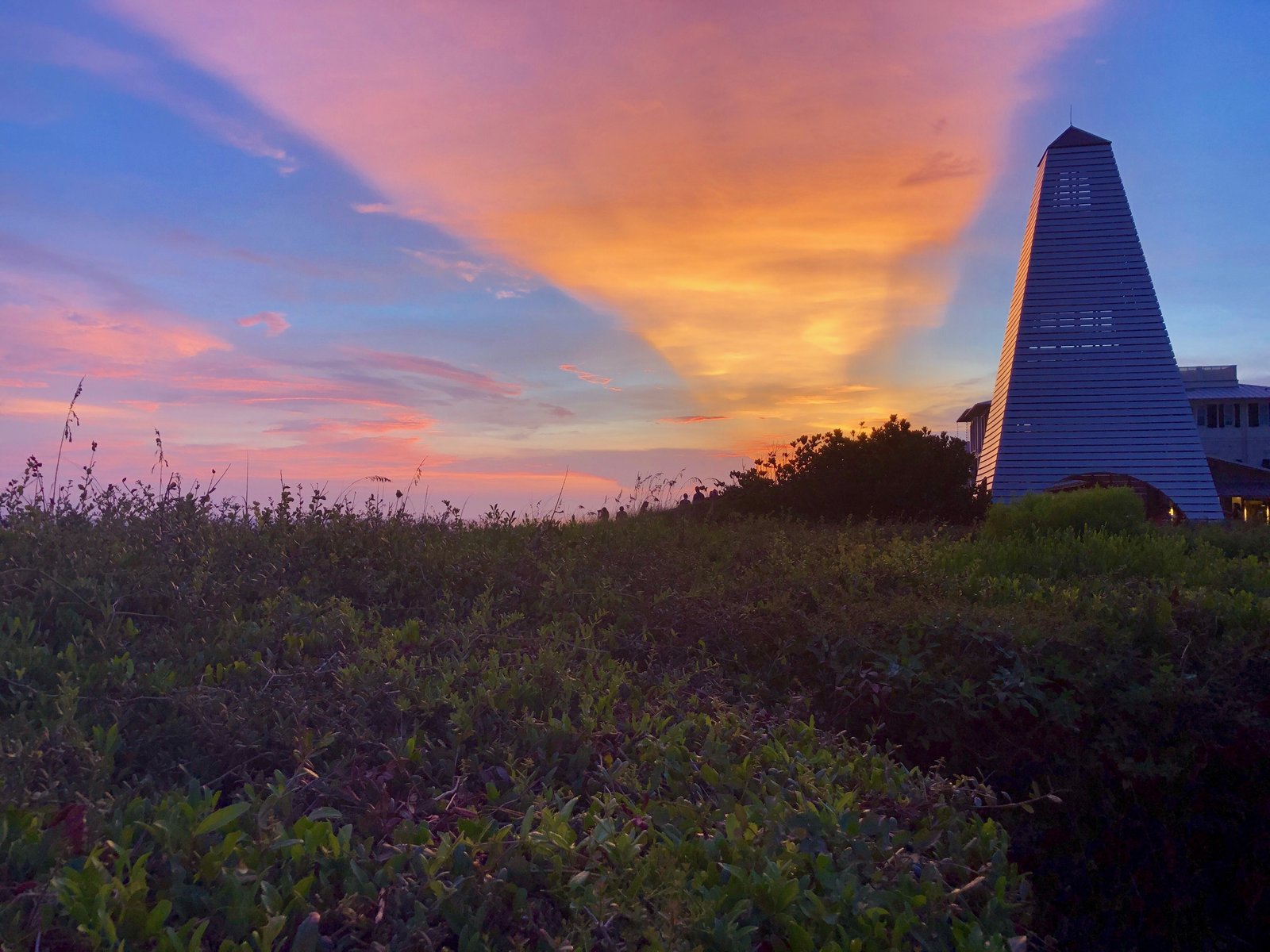 Sunset over Seaside Florida beach for 30A vacation outfits